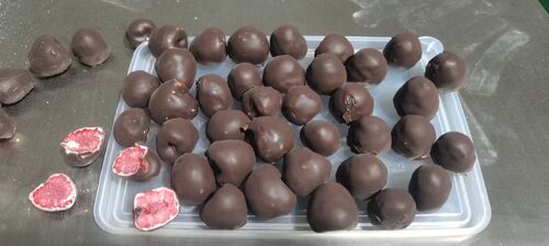 Cliente australiano riordina 2 set dopo un anno di prova: la nostra ricopritrice offre una copertura di cioccolato ai lamponi senza code